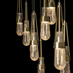Link 10-Light Blown Glass Pendant 10-Light Clear Bubble Glass (YG) in Modern Brass