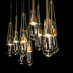 Link 10-Light Clear Glass Pendant 10-Light Clear Glass (ZM) in Modern Brass